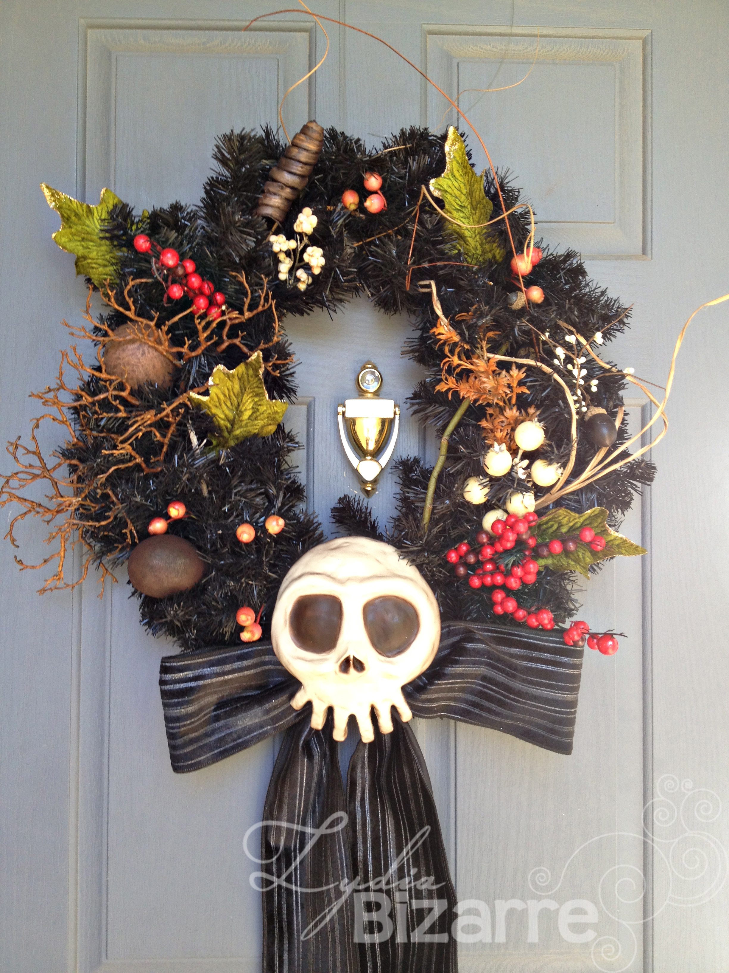 Haunted Mansion inspired wreath. Bone colored skull.